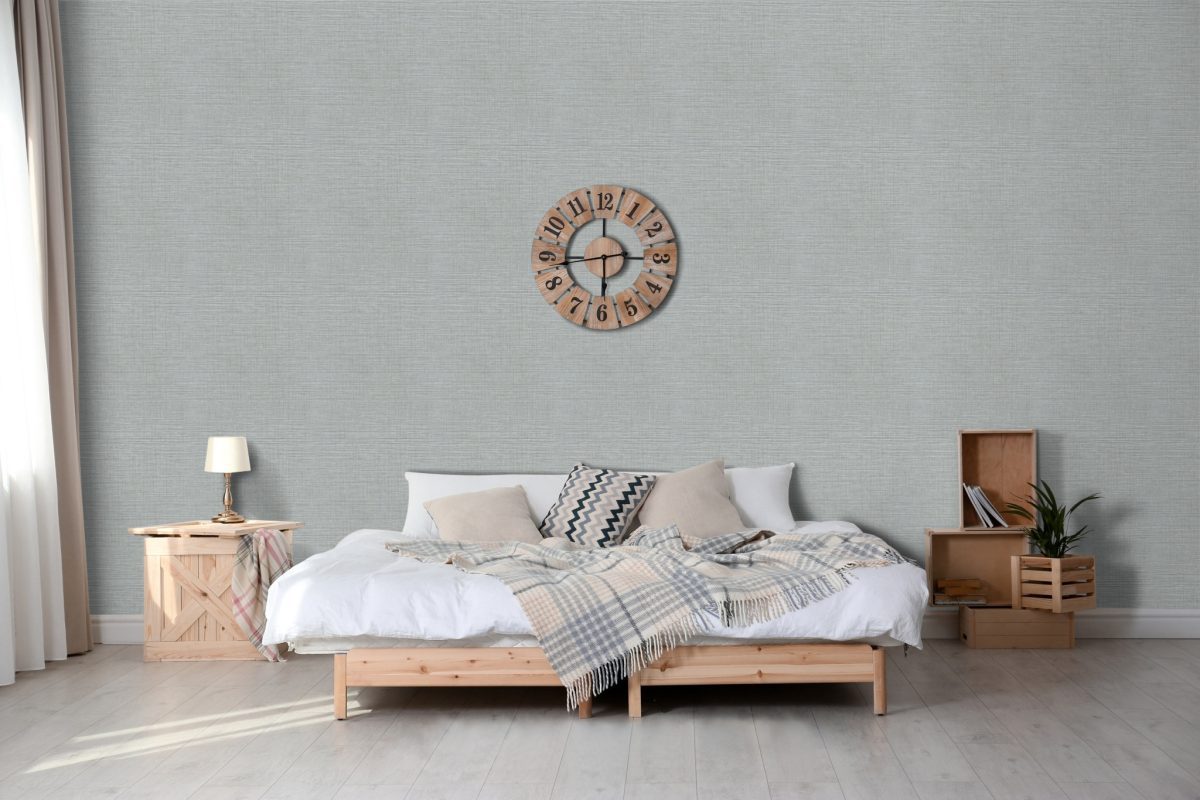 Papel mural non-woven lavable para interiores instalado en dormitorio